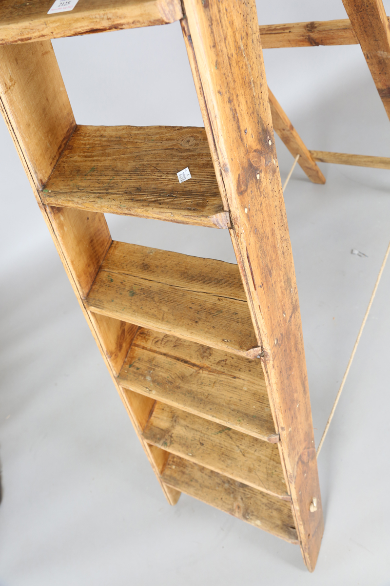 A mid-20th century stained pine eight-rung step ladder, height 167cm, width 35cm.Buyer’s Premium - Image 8 of 9