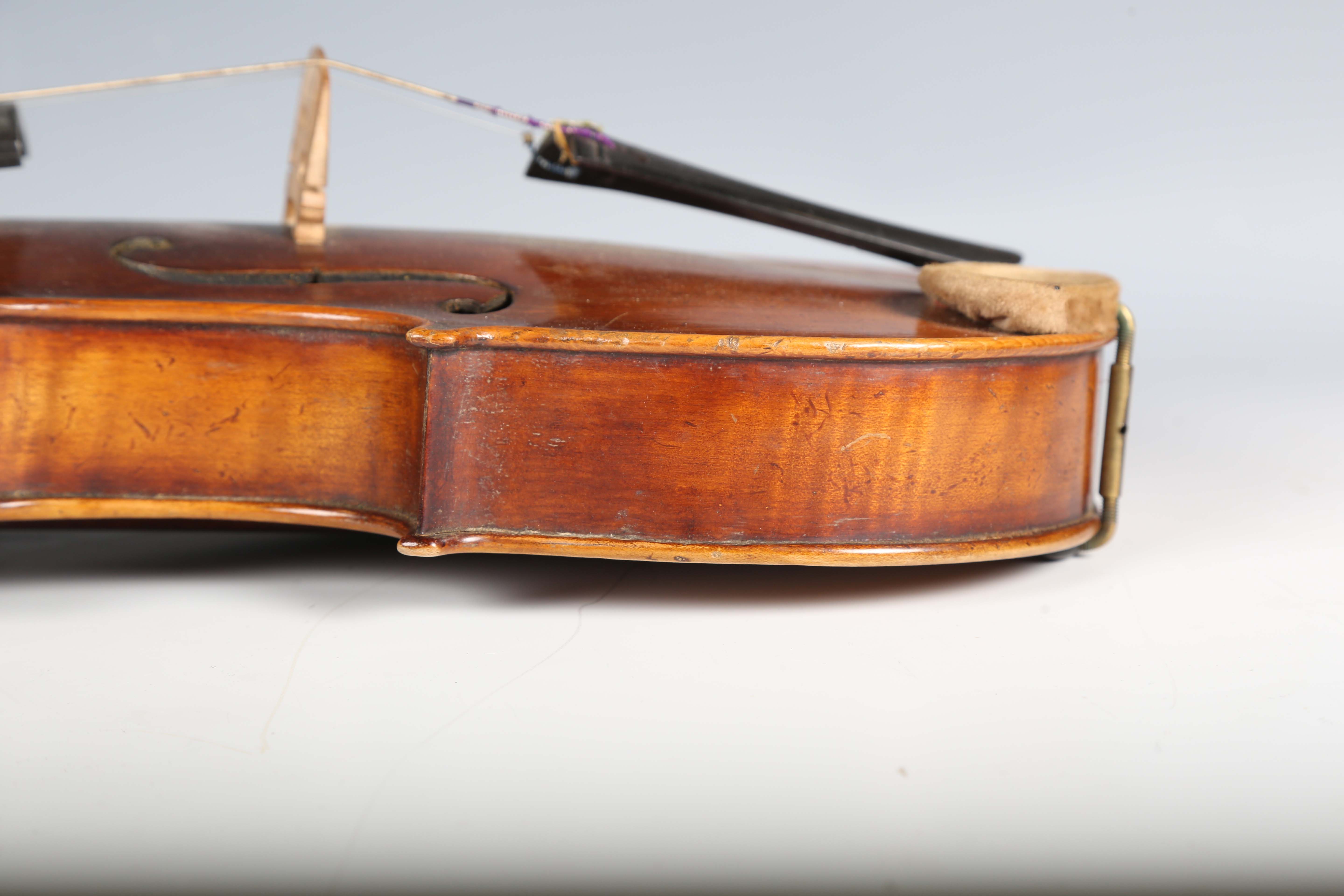A violin with striped two-piece back, bearing interior label detailed 'Antonius Stradivarius...', - Image 15 of 24