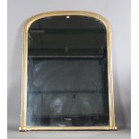 A large Victorian giltwood overmantel mirror of arched form, height 186cm, width 144cm.Buyer’s
