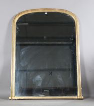 A large Victorian giltwood overmantel mirror of arched form, height 186cm, width 144cm.Buyer’s