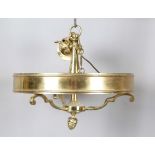 An Edwardian brass ceiling light, the circular support containing six lights above a pineapple