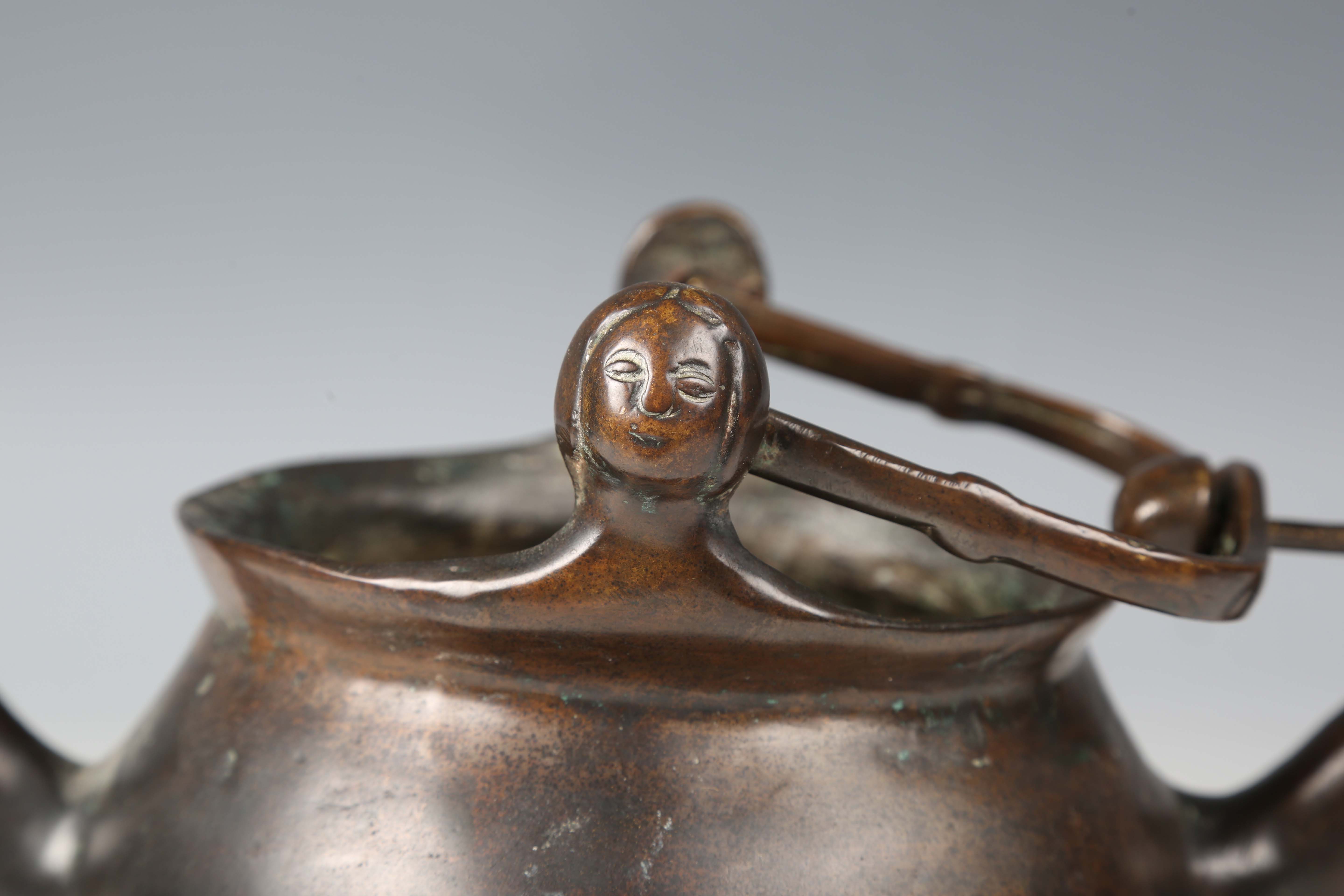 A 16th century Flemish patinated bronze lavabo, the swing handle above two female mask lugs, the - Image 10 of 10