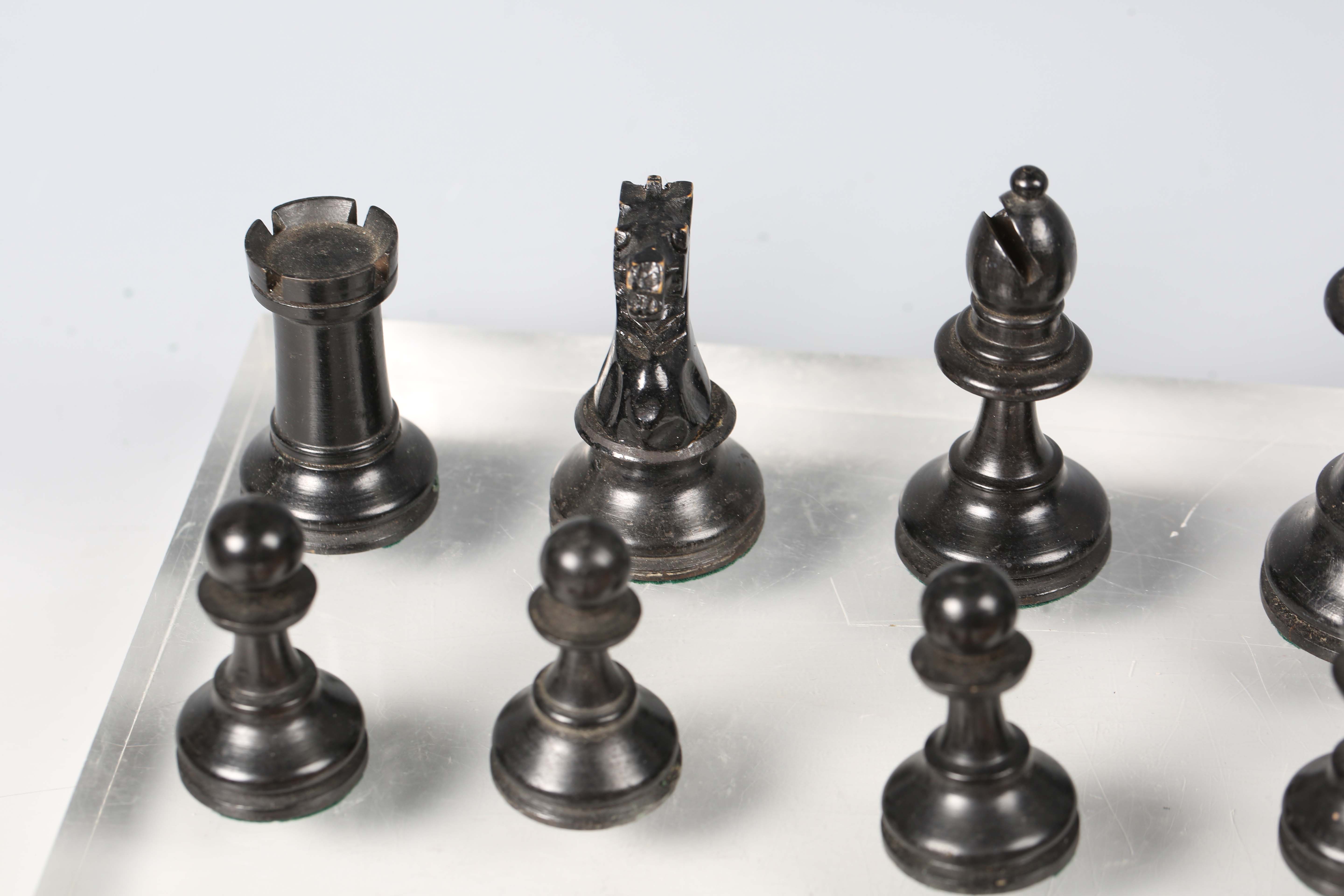 An early/mid-20th century boxwood and ebonized Staunton chess set with weighted bases, height of - Image 3 of 8