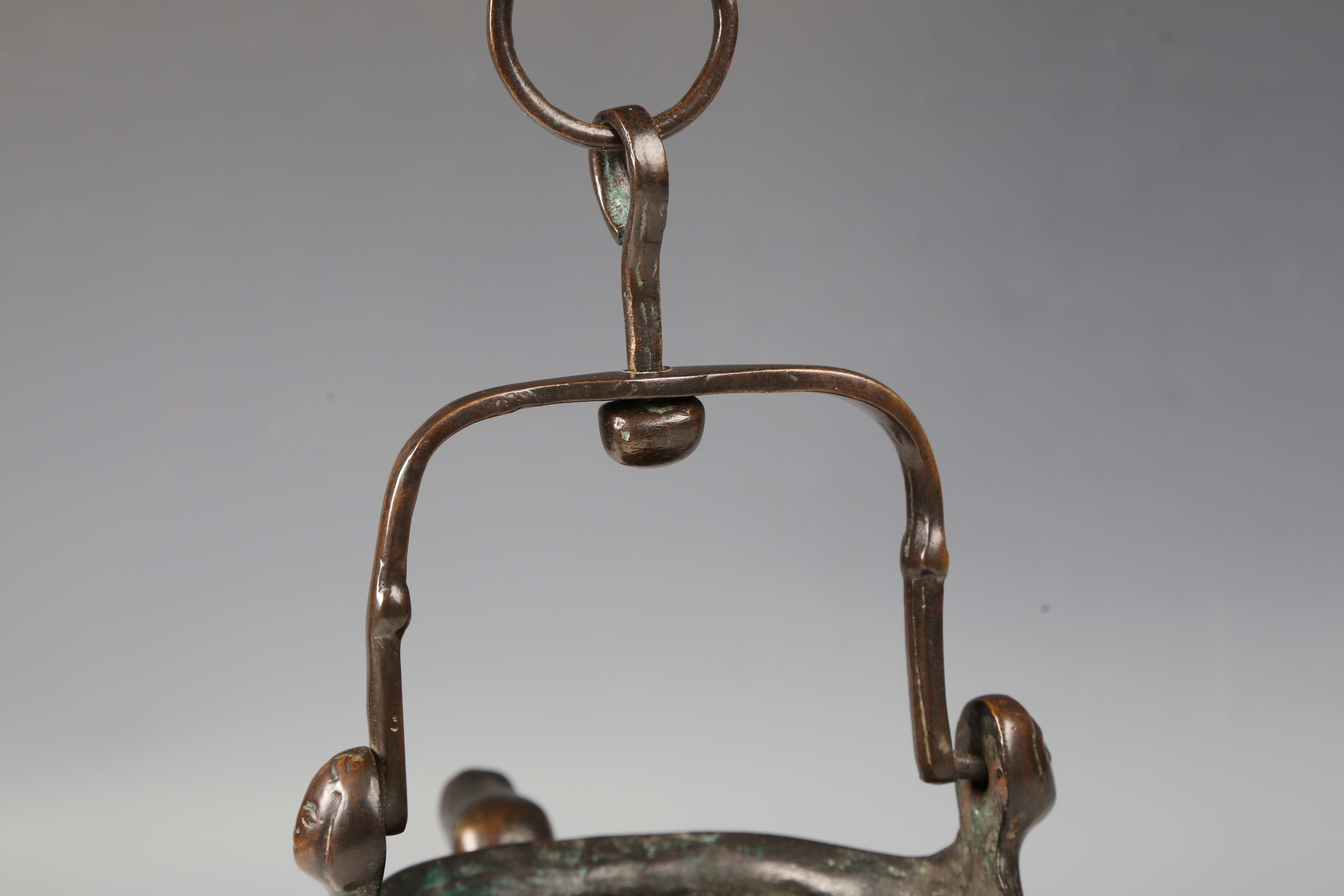 A 16th century Flemish patinated bronze lavabo, the swing handle above two female mask lugs, the - Image 9 of 10