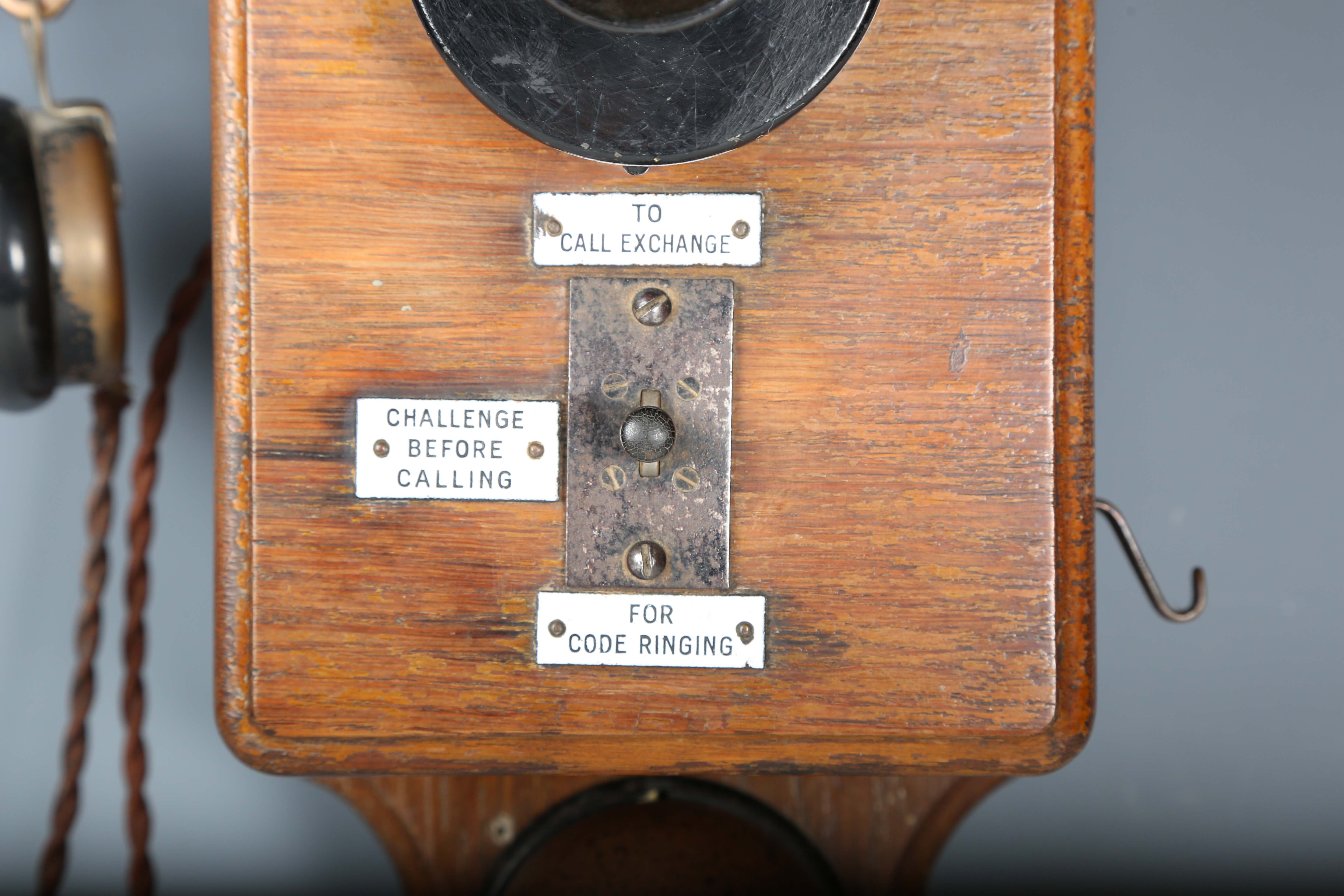 An early 20th century oak cased wall telephone, possibly from a railway, the front with applied - Image 9 of 10