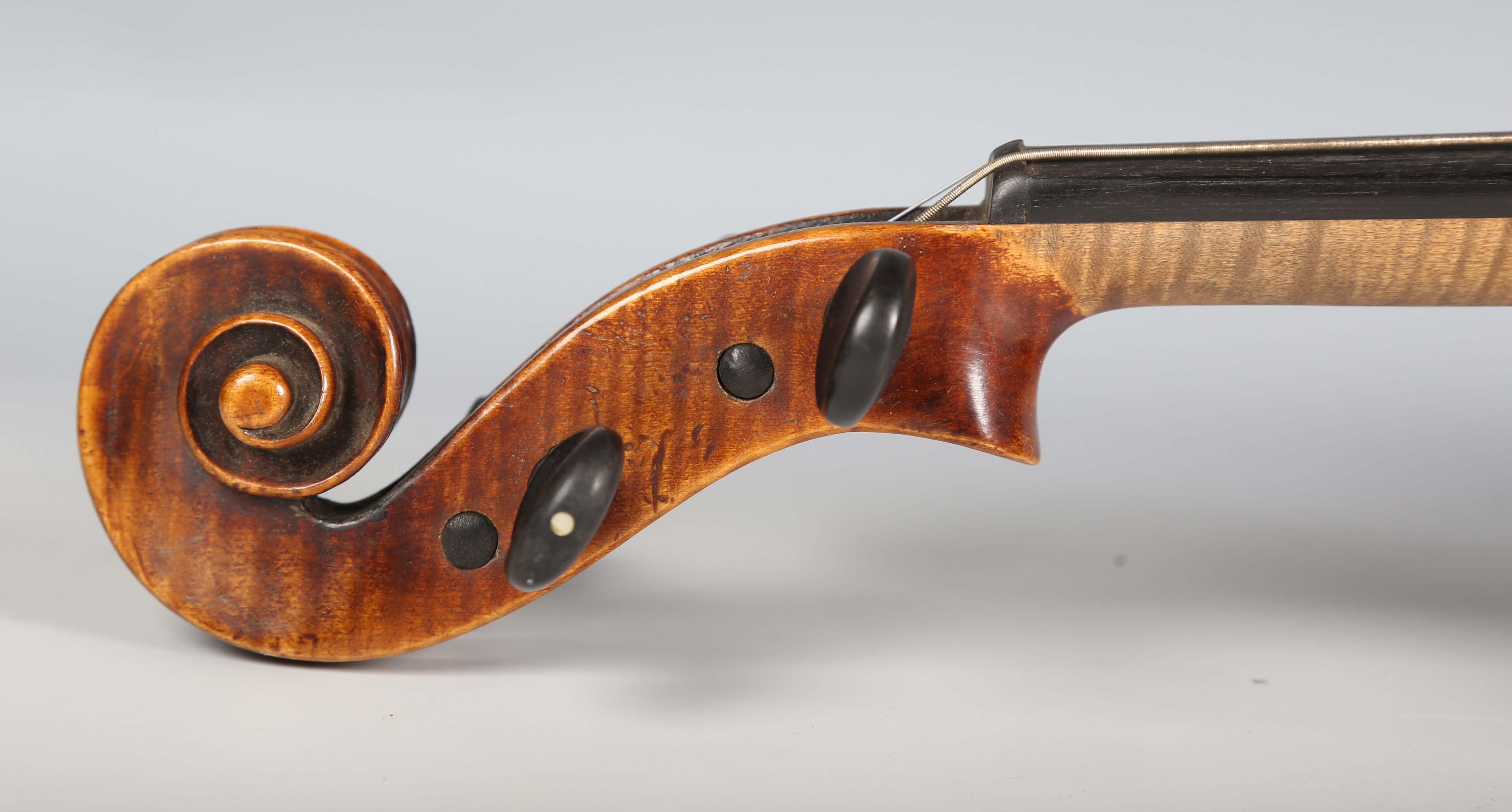 A violin with striped two-piece back, bearing interior label detailed 'Antonius Stradivarius...', - Image 19 of 24