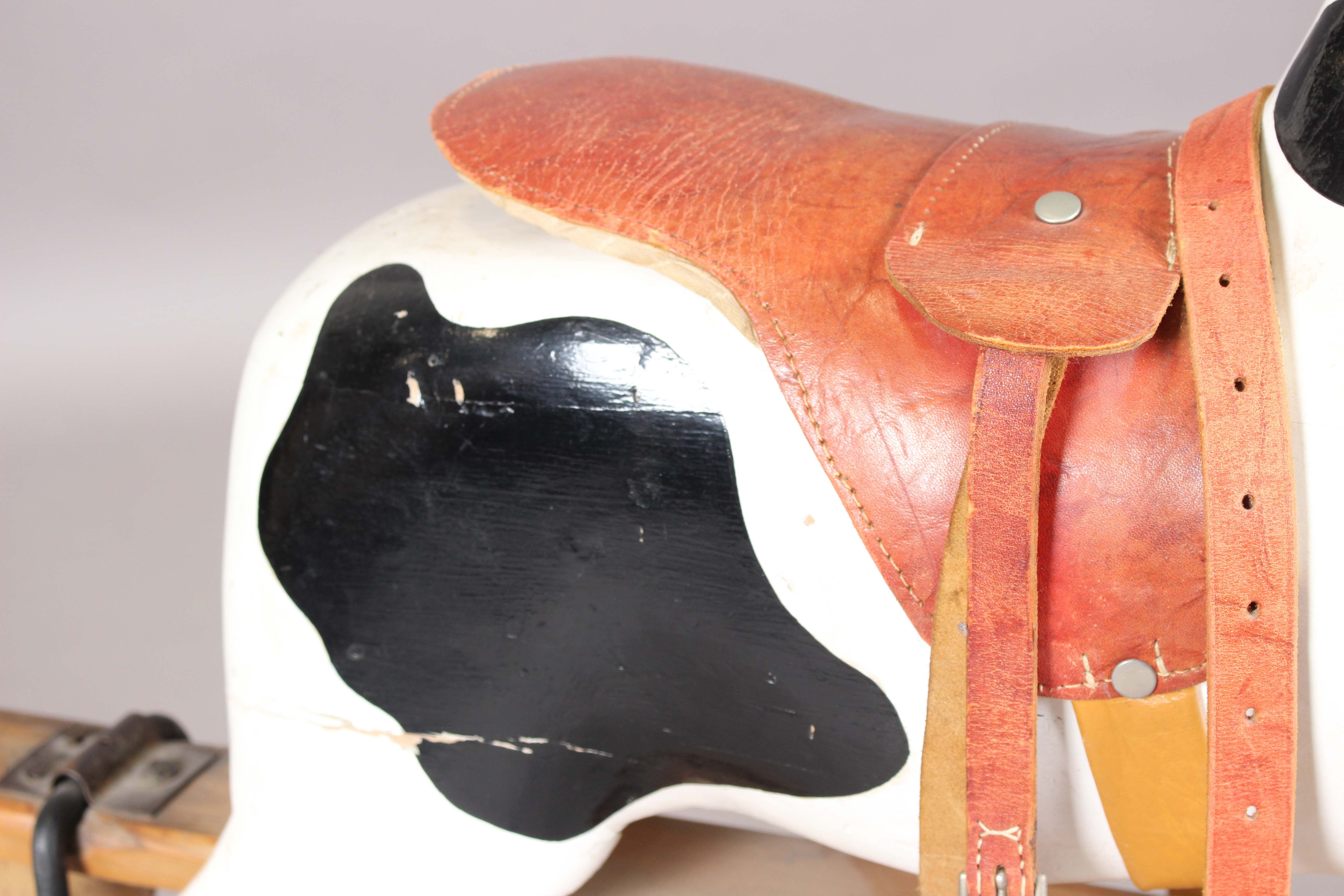 A 19th century carved and painted wooden rocking horse with later leather saddle and pine base, - Image 13 of 15