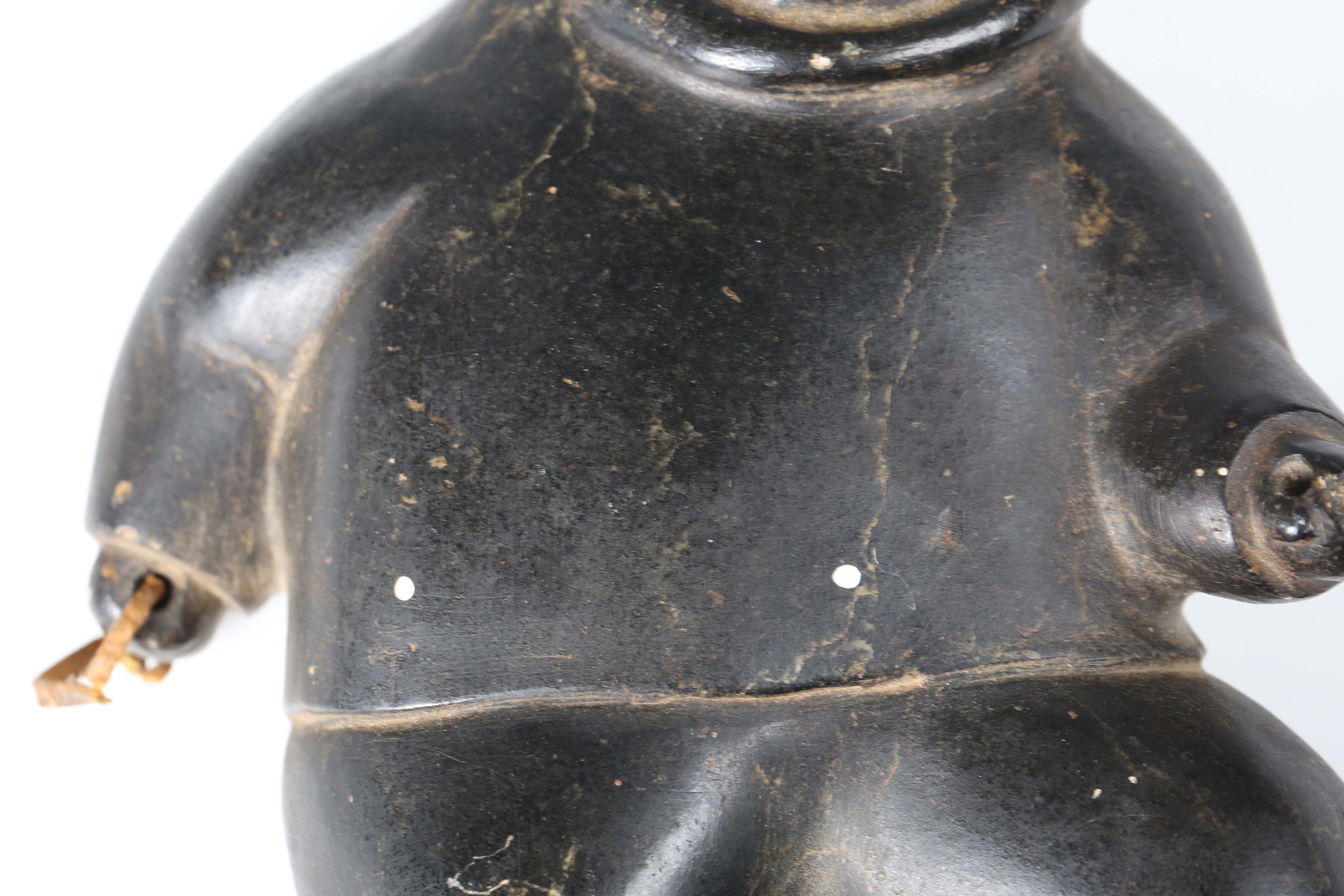 Two Inuit carved black stone figures, one modelled as an Inuit, height 19cm, the other as a - Image 7 of 13