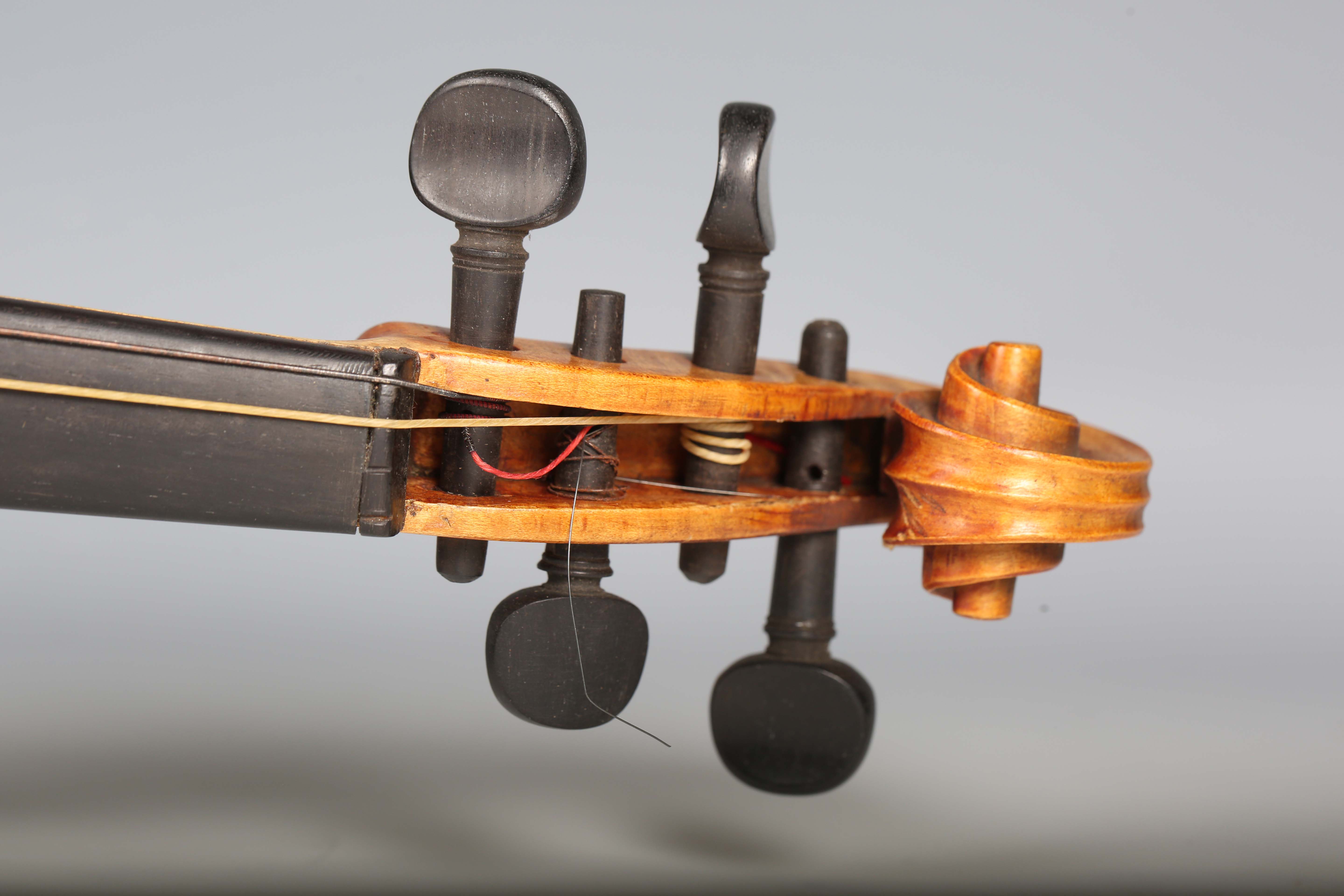 A violin with two-piece back, bearing interior label indistinctly inscribed 'G.A. How 1914', - Image 29 of 53
