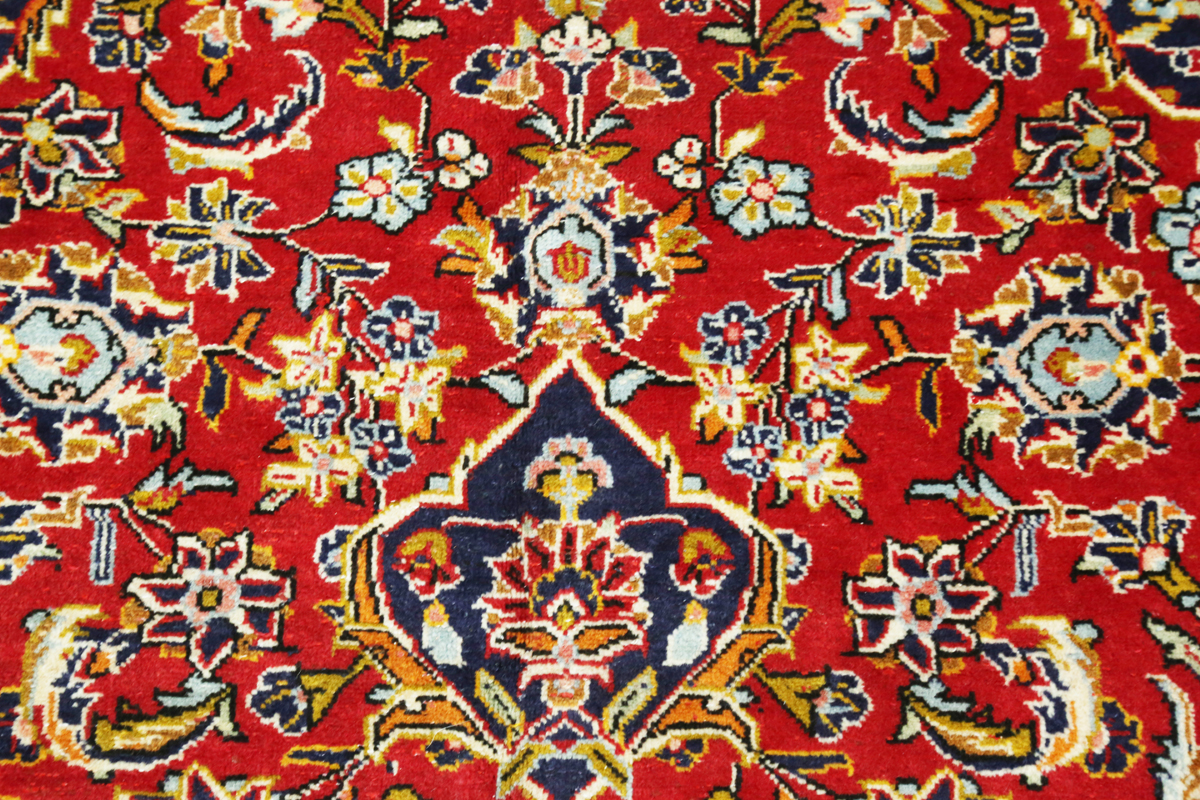 A Kashan carpet, Central Persia, late 20th century, the red field with a shaped medallion, within - Image 6 of 7