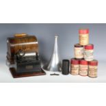 An Edison Gem phonograph, within an oak case with aluminium horn, and a small collection of