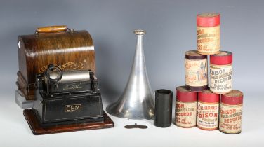 An Edison Gem phonograph, within an oak case with aluminium horn, and a small collection of