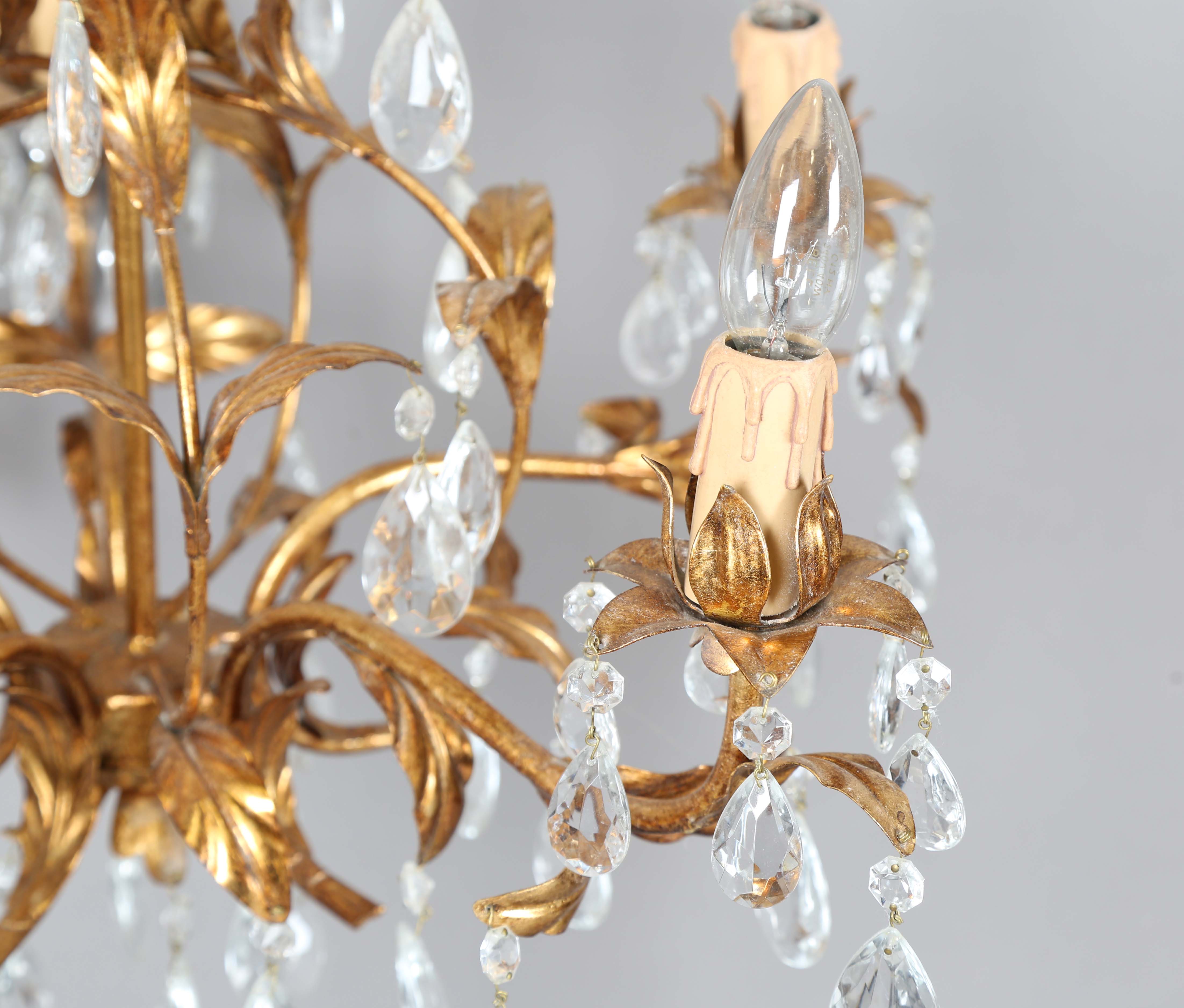 A 20th century gilt metal and cut glass five-light chandelier, height 60cm, width 55cm.Buyer’s - Image 5 of 9