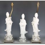 A group of three 20th century Chinese blanc-de-Chine porcelain figures of Guanyin, two mounted as