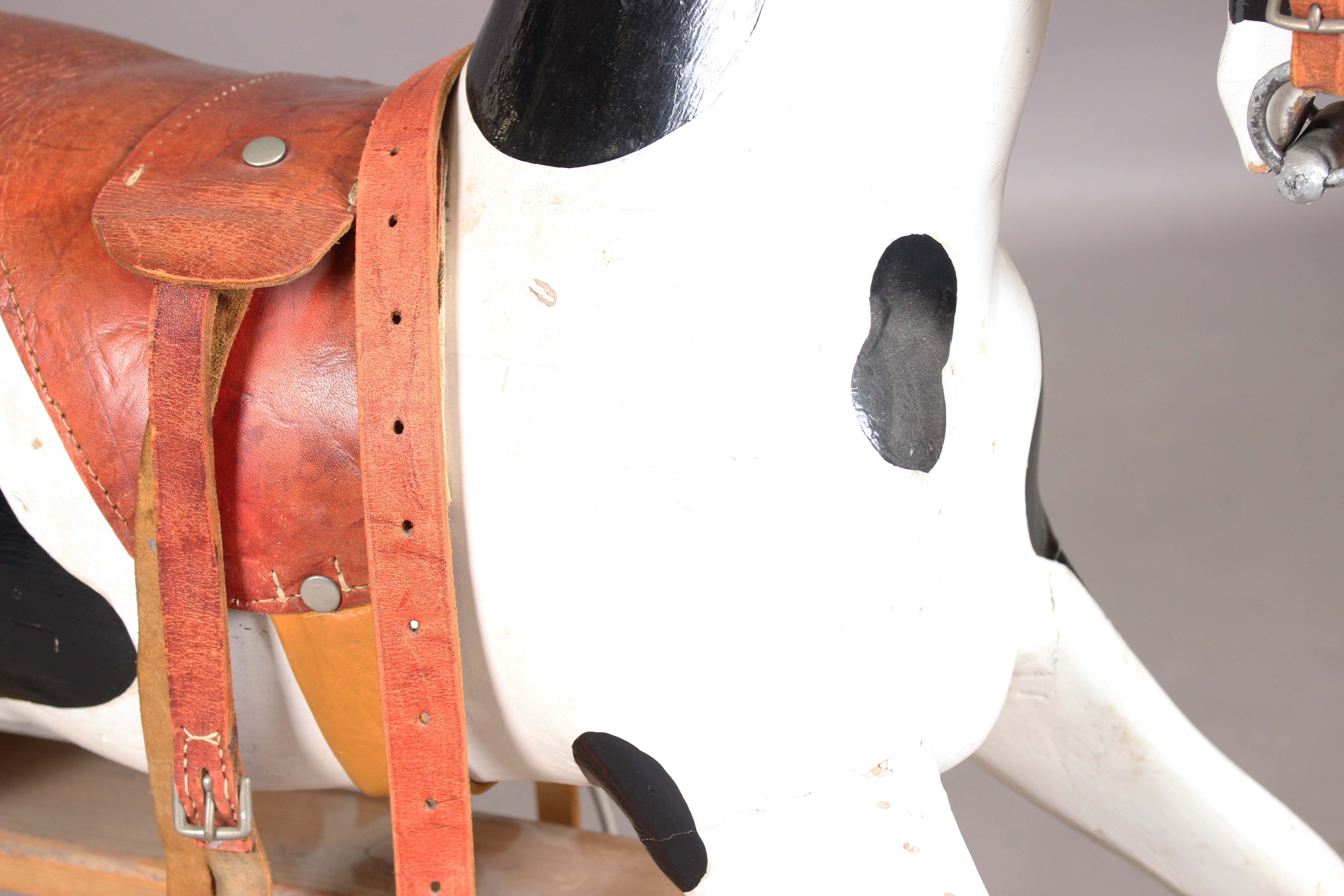 A 19th century carved and painted wooden rocking horse with later leather saddle and pine base, - Image 14 of 15