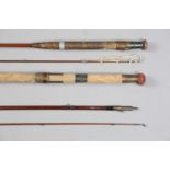 A collection of split cane and other fishing rods and accessories, including two Hardy greenheart