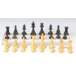 An early/mid-20th century boxwood and ebonized Staunton chess set with weighted bases, height of