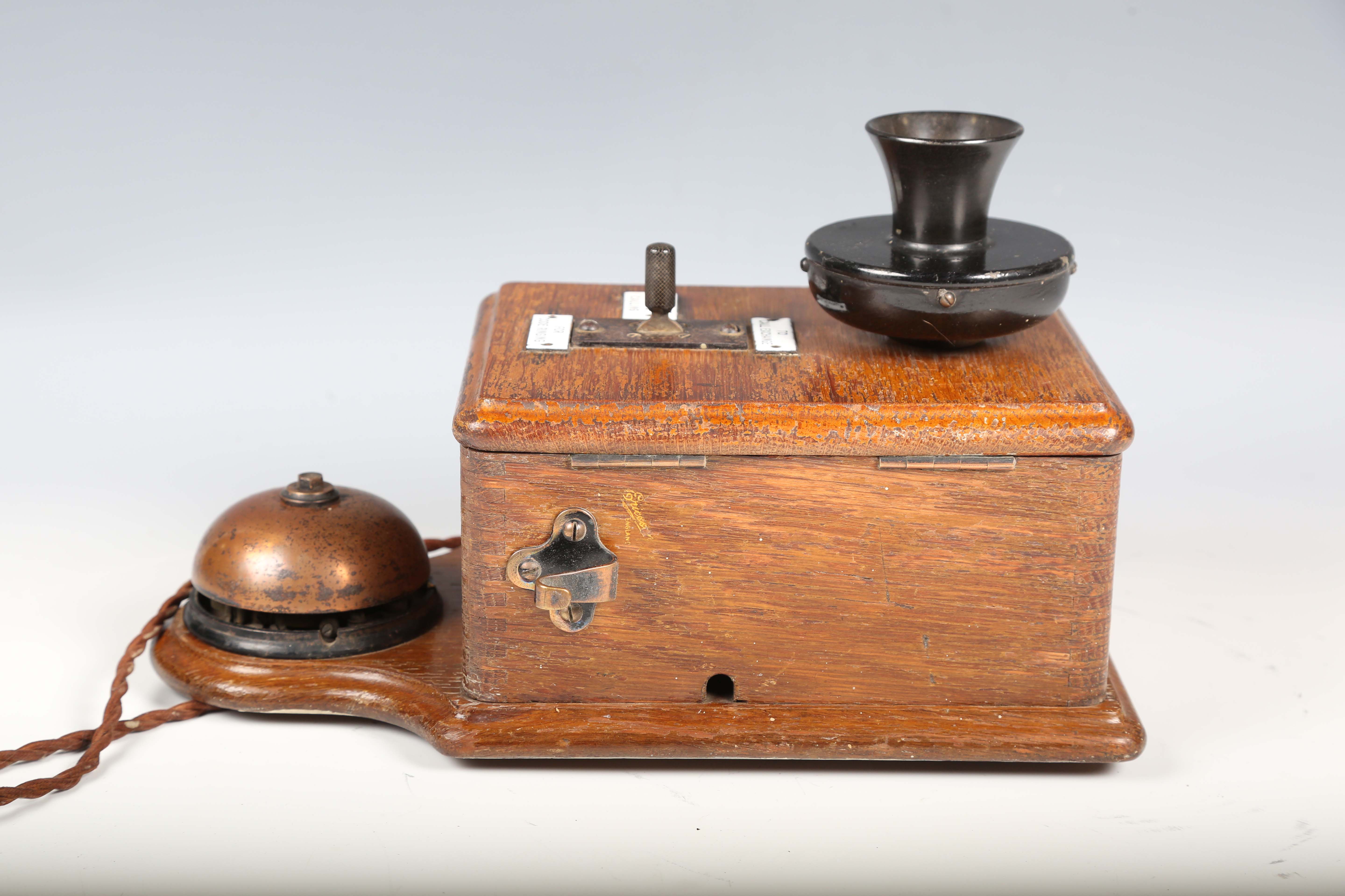 An early 20th century oak cased wall telephone, possibly from a railway, the front with applied - Image 4 of 10