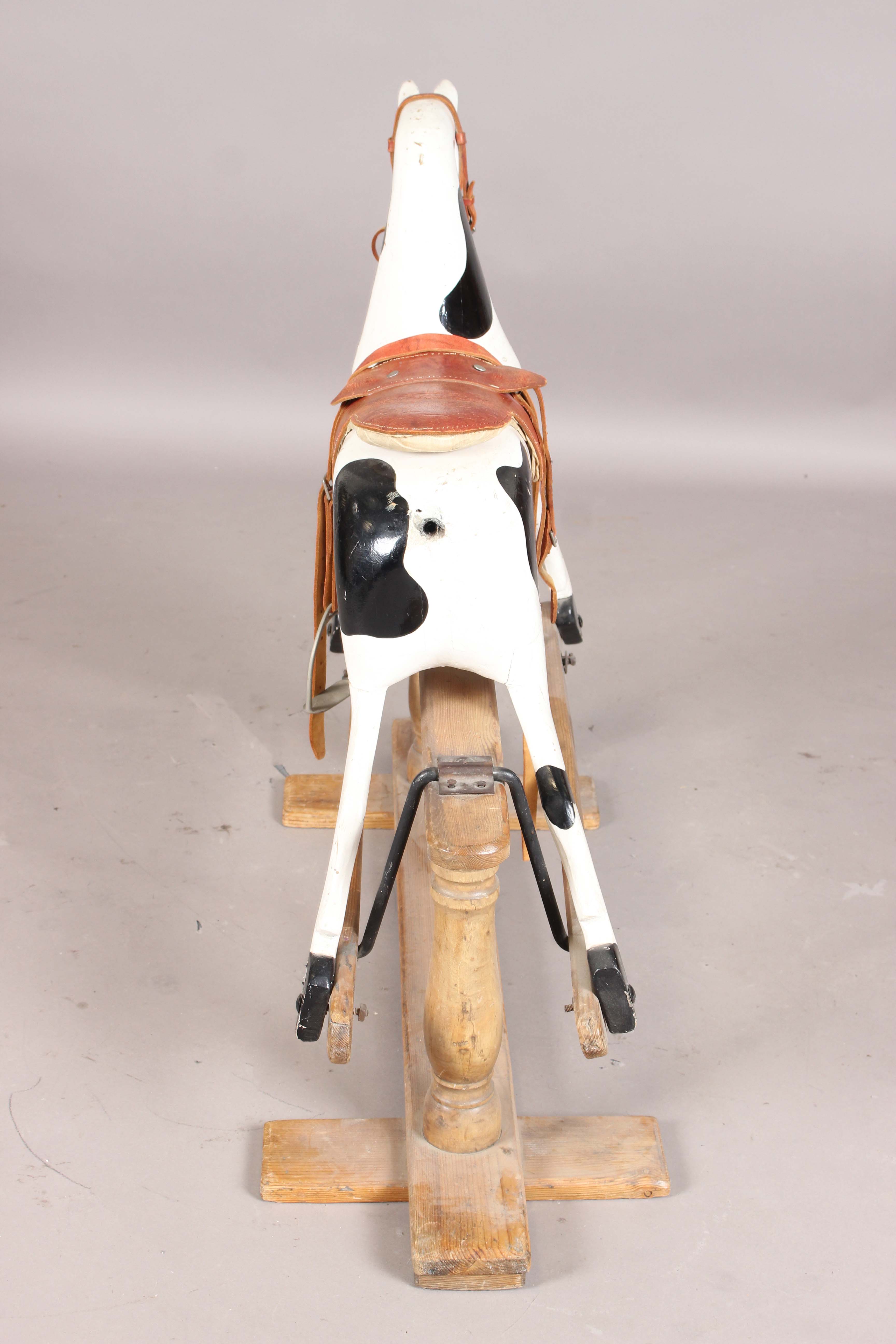 A 19th century carved and painted wooden rocking horse with later leather saddle and pine base, - Image 3 of 15