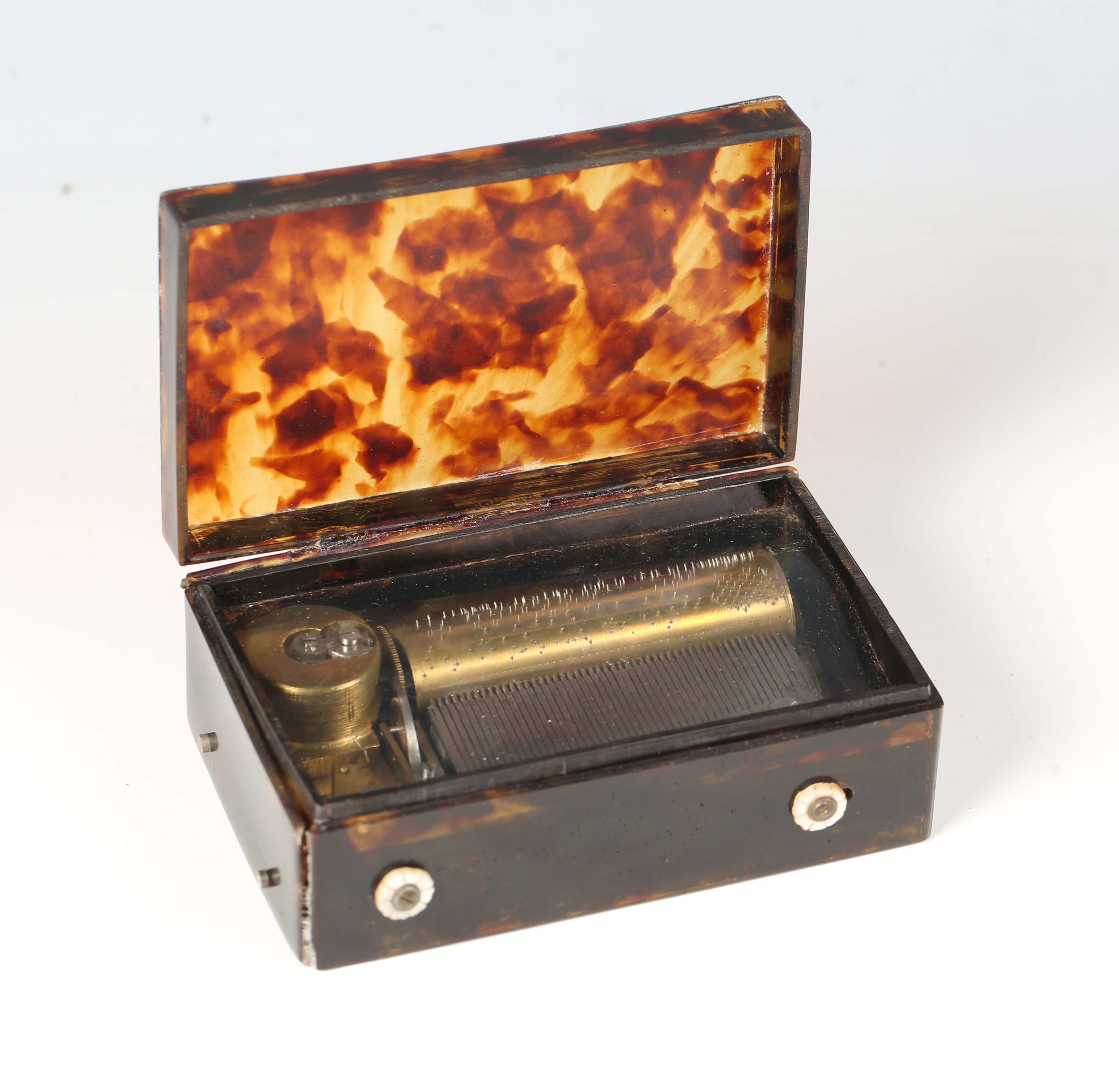 A 19th century tortoiseshell cased musical box, the hinged lid enclosing a cylinder movement,