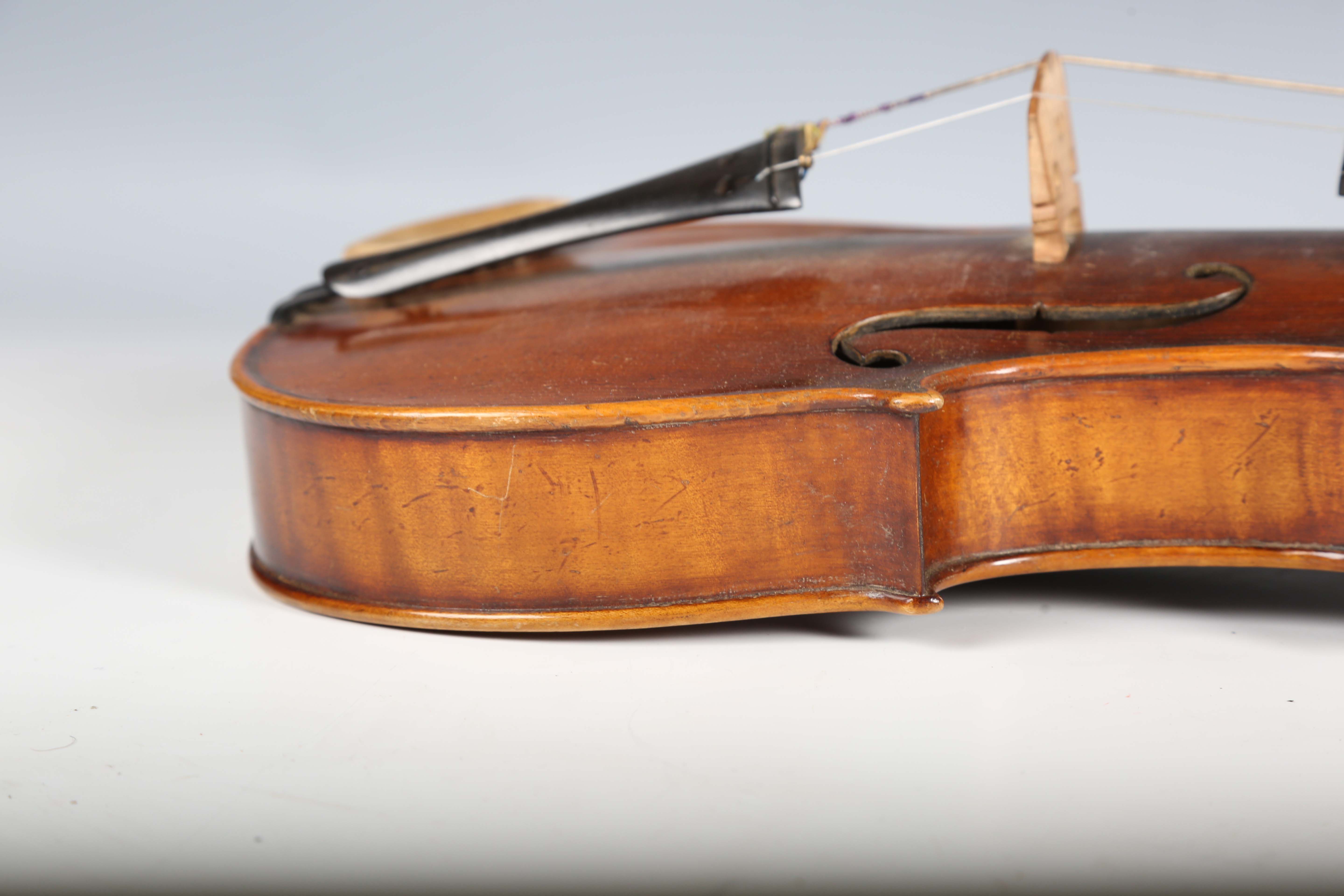 A violin with striped two-piece back, bearing interior label detailed 'Antonius Stradivarius...', - Image 5 of 24