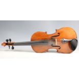 A violin with striped two-piece back, length of back excluding button 36cm, cased with a bow.Buyer’s