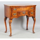 A mid-20th century Queen Anne style walnut side table, on carved cabriole legs, height 78cm, width