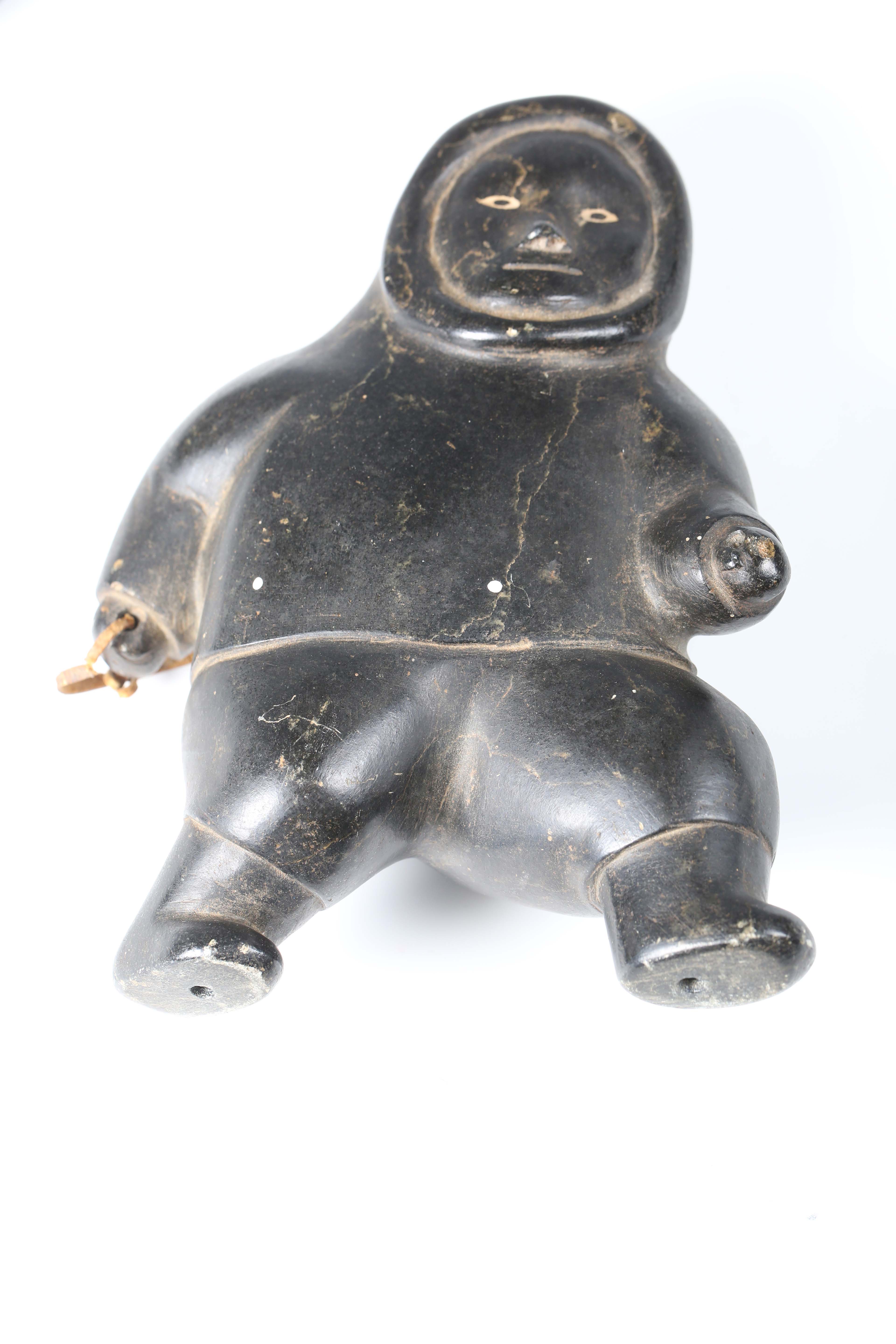 Two Inuit carved black stone figures, one modelled as an Inuit, height 19cm, the other as a - Image 9 of 13