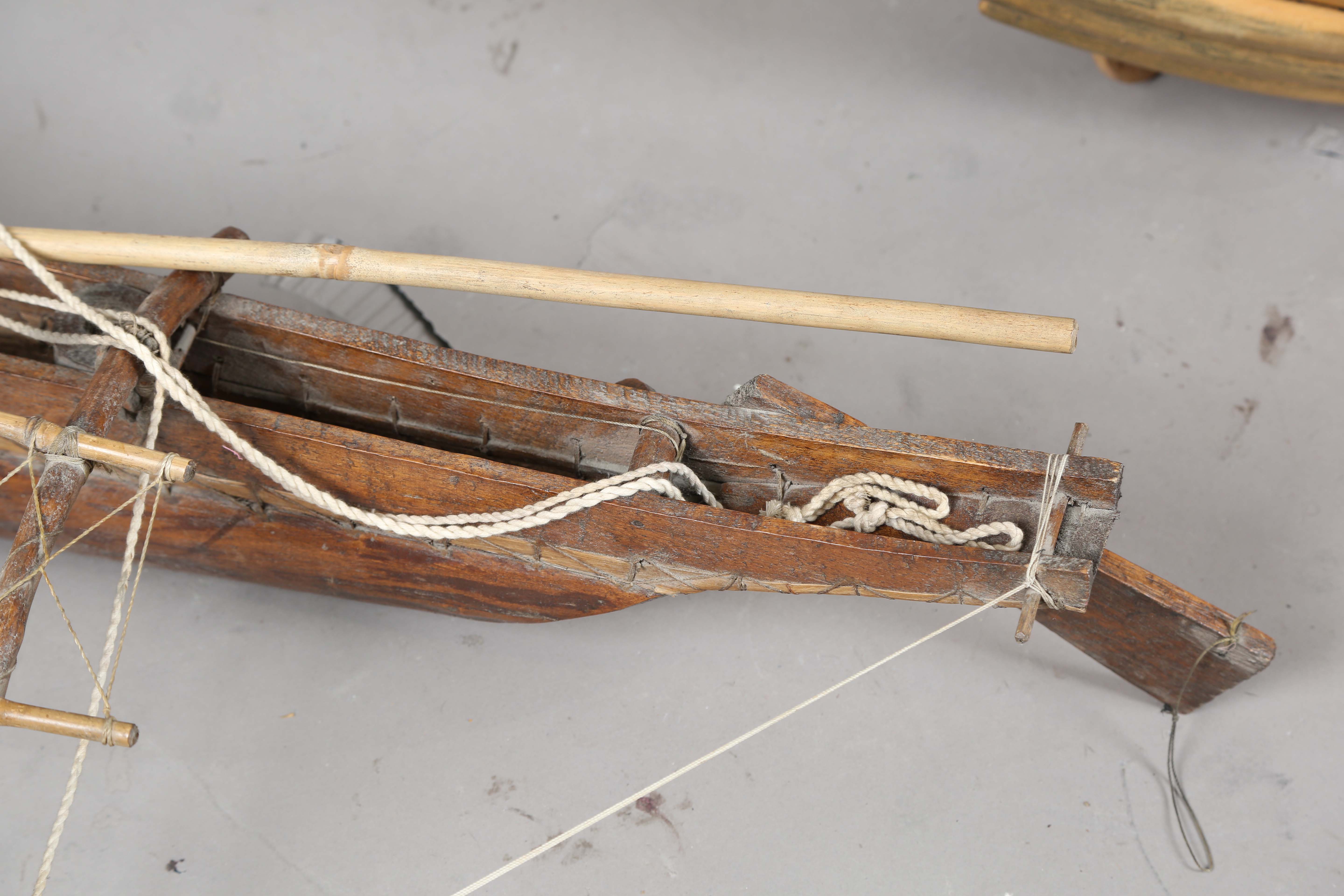 An early 20th century scratch-built softwood model of a boat, detailed with two brass cannons and - Image 6 of 13