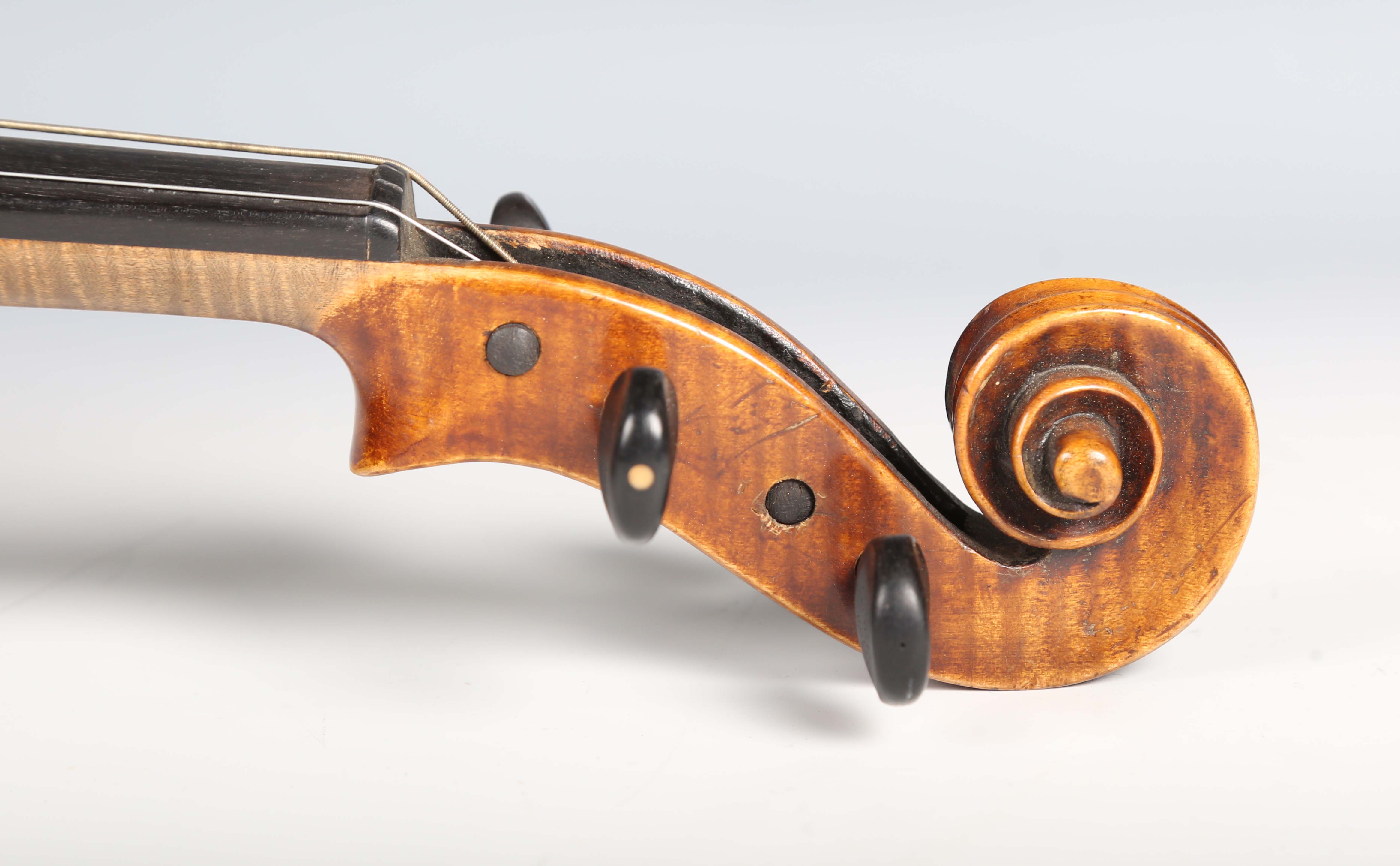 A violin with striped two-piece back, bearing interior label detailed 'Antonius Stradivarius...', - Image 8 of 24