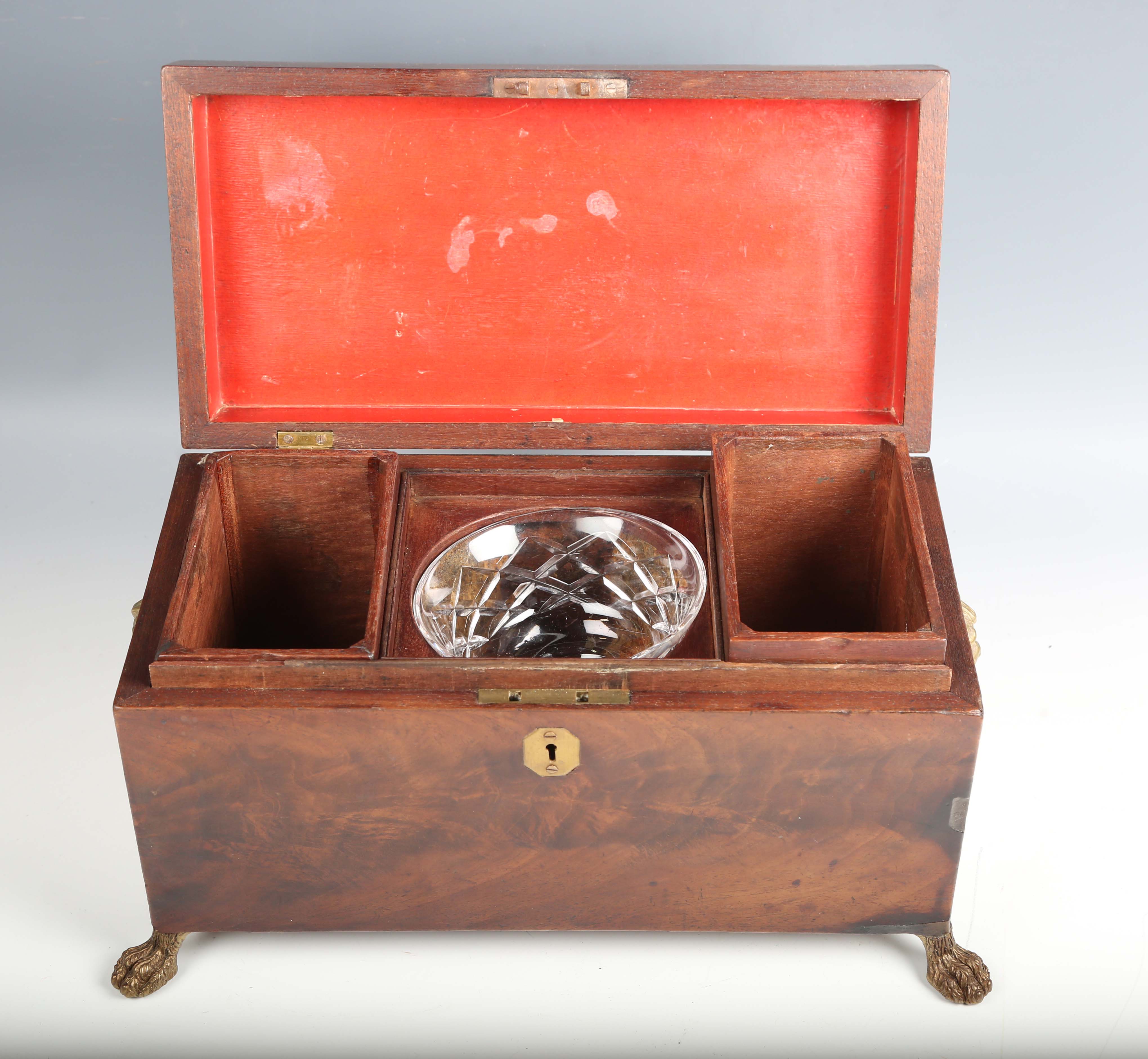 A Regency figured mahogany tea caddy with lion mask ring handles and claw feet, width 34cm.Buyer’s - Image 12 of 12
