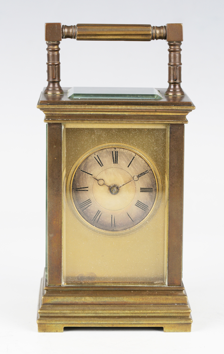 A late 19th/early 20th century brass cased carriage timepiece with eight day movement, the