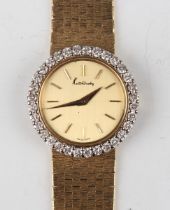 A Kutchinsky 18ct gold and diamond set lady's dress wristwatch with Chopard jewelled movement, the