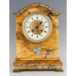A late 19th Century French Siena marble cased mantel clock with eight day movement striking on a