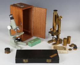 A lacquered brass monocular microscope, signed 'R & J Beck London 7979', with rack and pinion