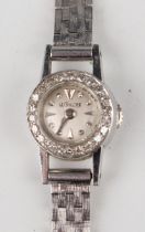 A LeCoultre white gold and diamond set rear-winding lady's dress wristwatch with signed silvered