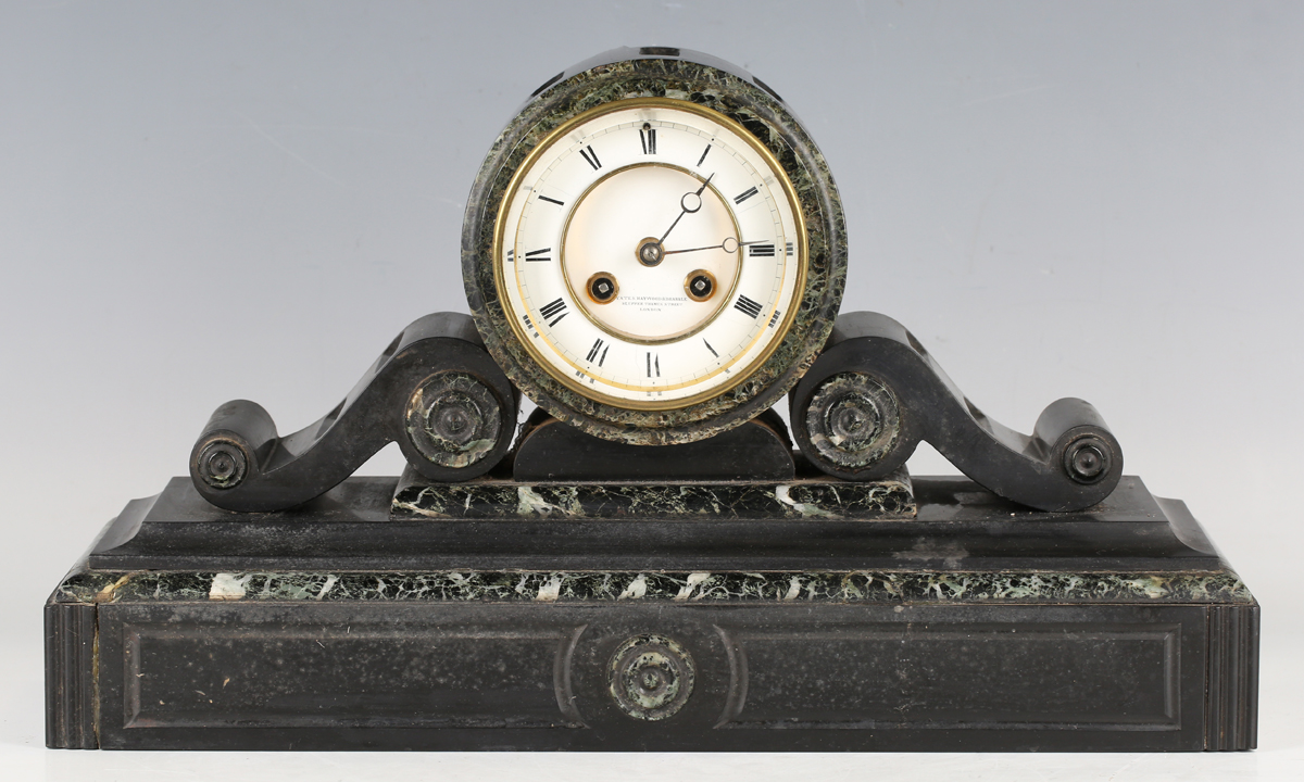 A late 19th century French slate and marble cased mantel clock with eight day movement striking on a