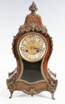 A late 19th century French gilt metal mounted and red tortoiseshell boulle cased mantel clock with