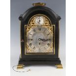 A George III ebonized bracket clock with eight day triple fusee movement striking and chiming