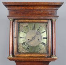 An early 18th century and later oak longcase clock with eight day movement striking on a bell, the