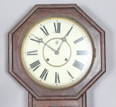 A late 19th century American rosewood octagonal drop dial wall clock with eight day movement