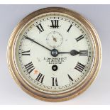An early 20th century brass circular cased ship's timepiece, the unsigned movement with platform