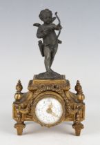A late 19th century French gilt metal and patinated spelter mantel timepiece, the movement with
