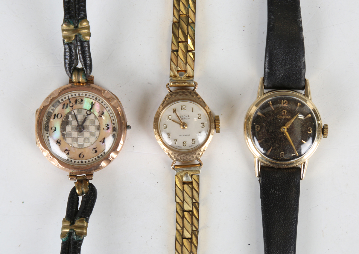An Omega gilt metal circular cased lady's wristwatch, circa 1958, with signed jewelled 244 caliber