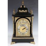 An impressive Victorian ebonized and brass mounted bracket clock with eight day triple fusee