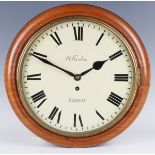 A late Victorian mahogany circular cased wall timepiece with eight day single chain fusee