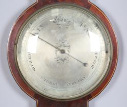 A 19th century mahogany wheel barometer of large proportions, with silvered dials, hygrometer,
