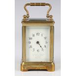 An early 20th century French brass cased diminutive carriage timepiece with eight day movement,