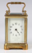 An early 20th century French brass cased diminutive carriage timepiece with eight day movement,