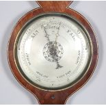 A 19th century mahogany wheel barometer with silvered dials, hygrometer, alcohol thermometer and